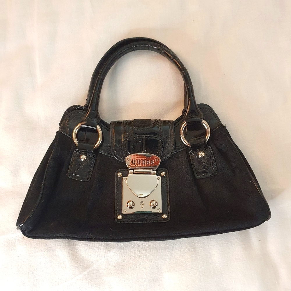 Guess small black handheld bag /clutch
